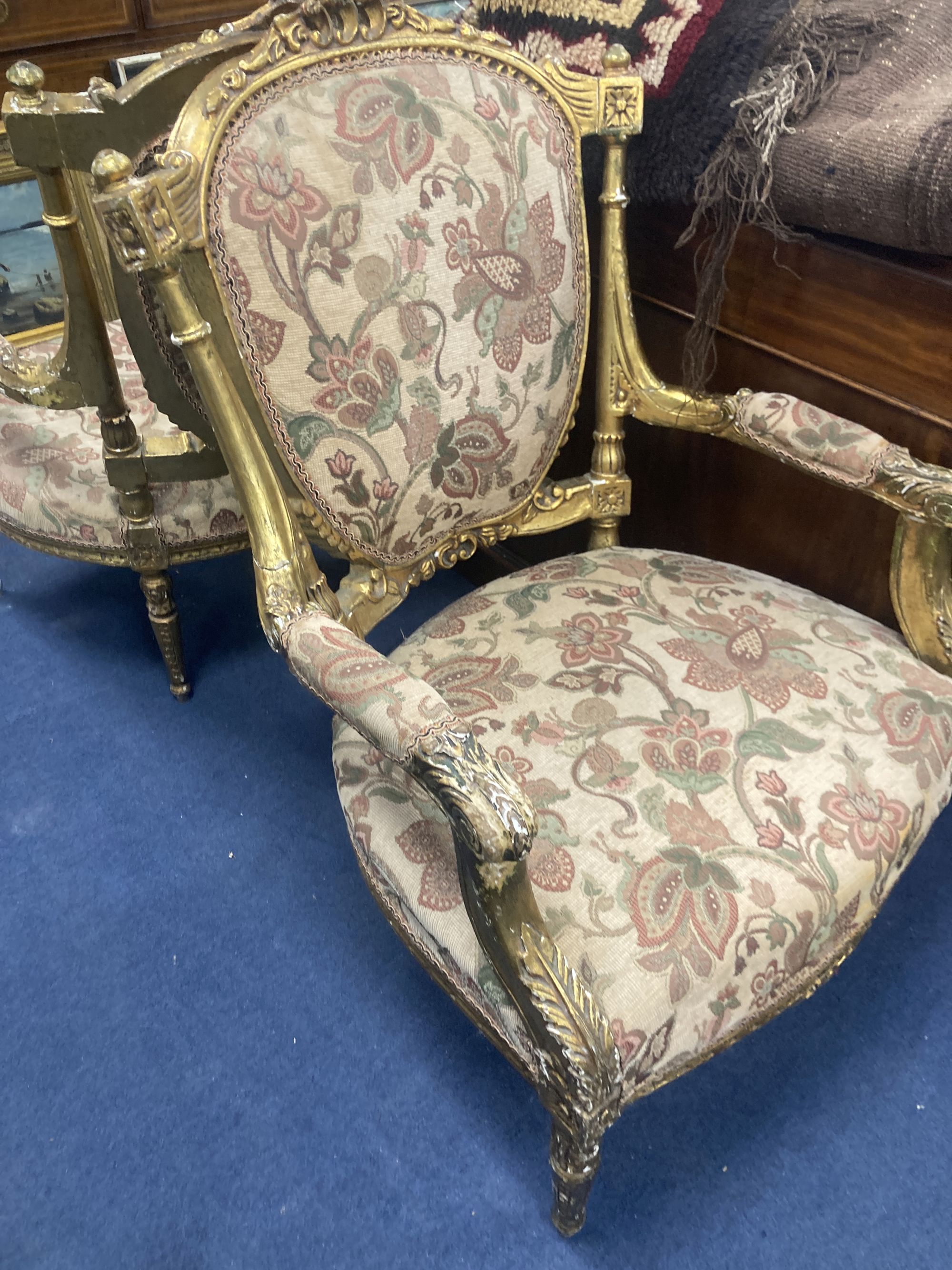 A pair of Louis XVI design giltwood and gesso open armchairs, width 66cm, depth 60cm, height 96cm